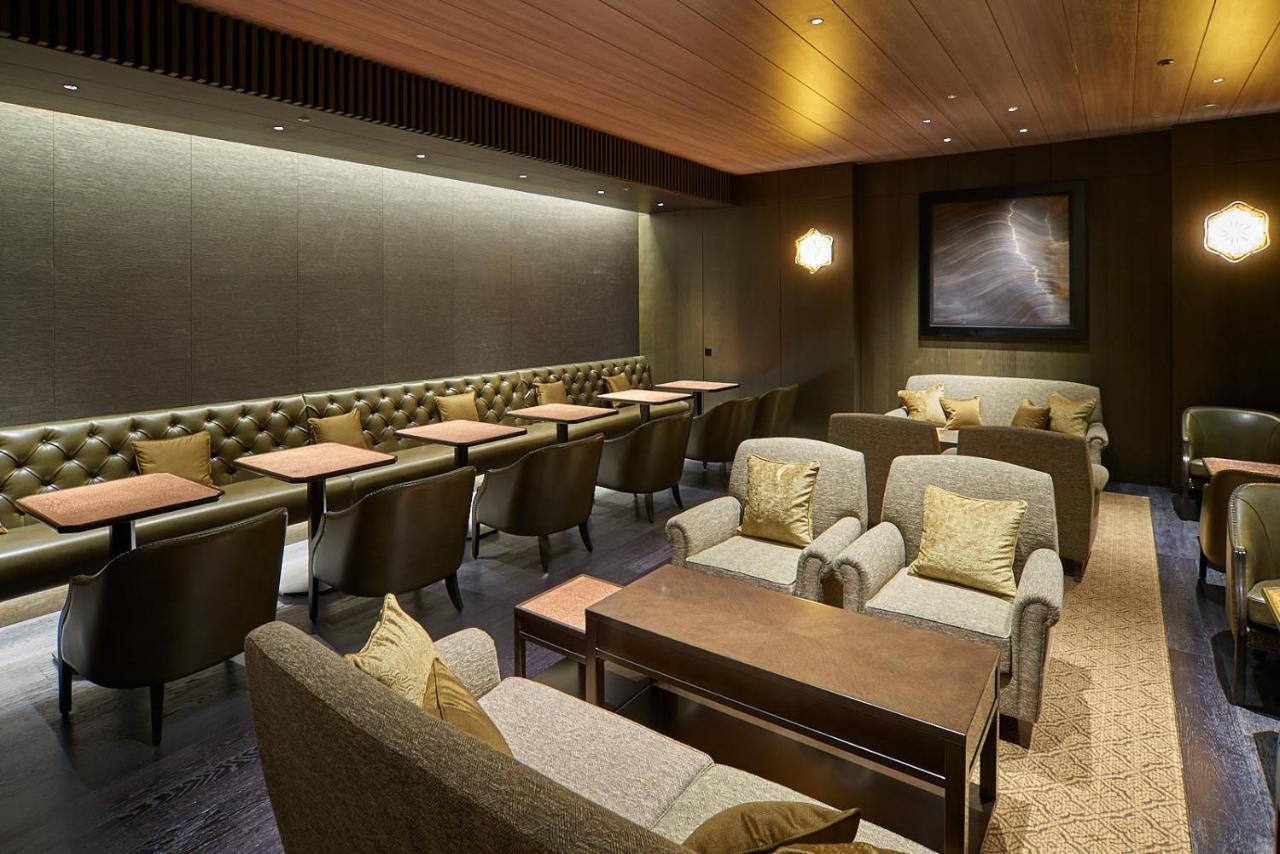 Отель The Okura Токио Экстерьер фото The Wing at Hong Kong International Airport