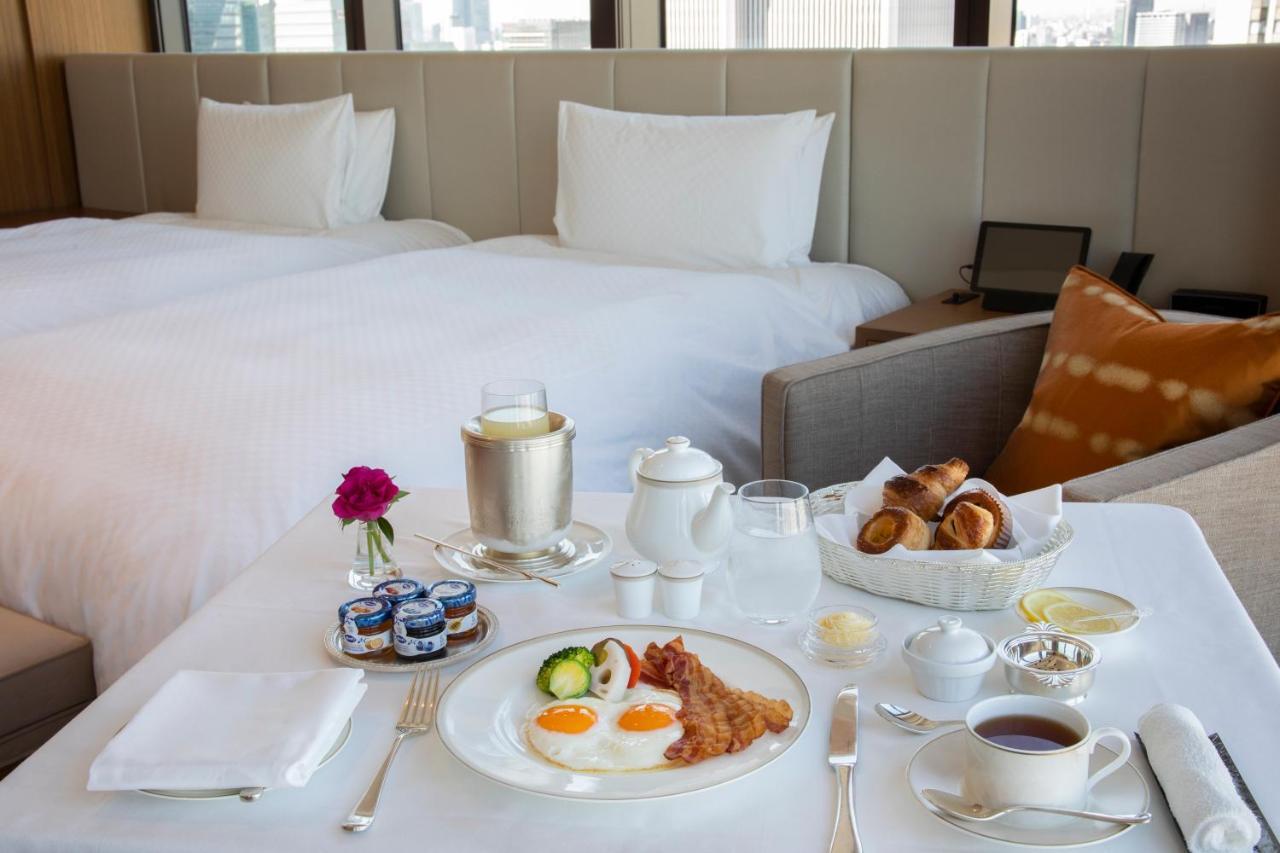 Отель The Okura Токио Экстерьер фото Room service